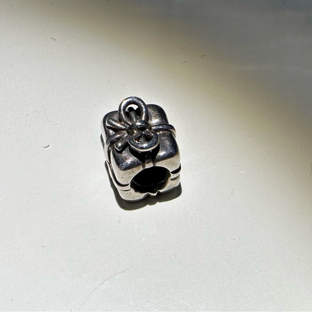 Pandora (retired) gift charm